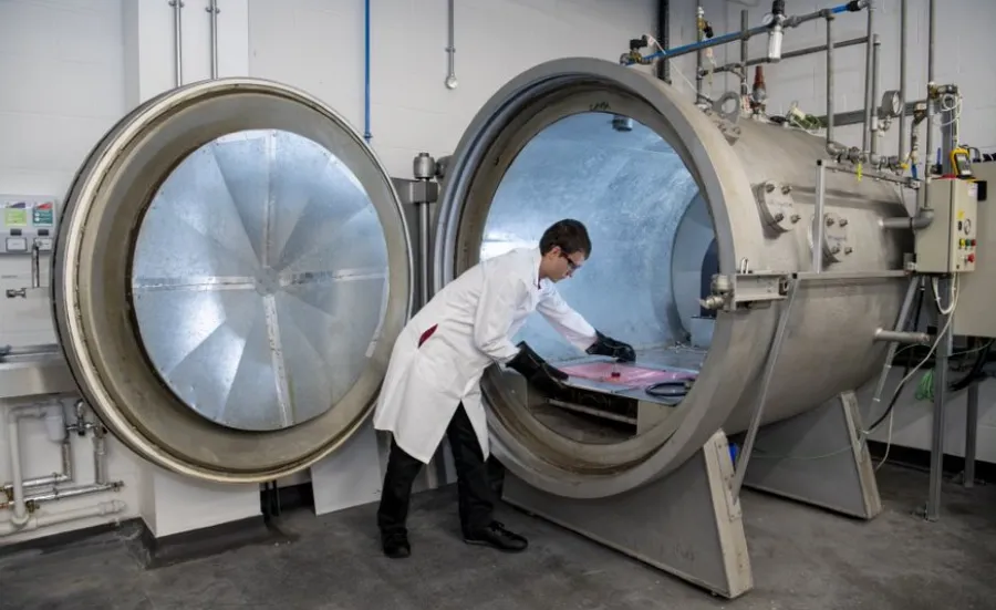 A student at work in the testing and structures research lab