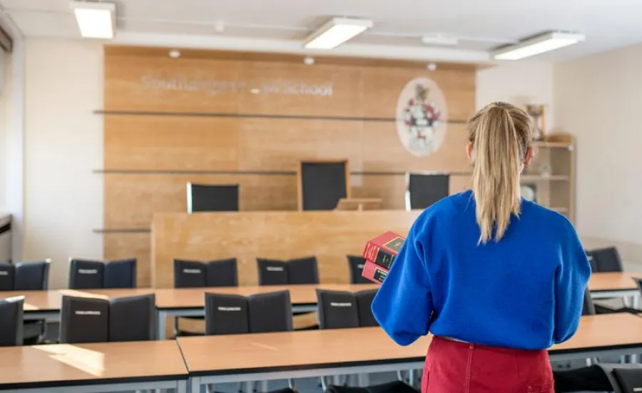 A student in the mooting room at ƱAPP_ĿͲƱ-ٷϷ, Law School