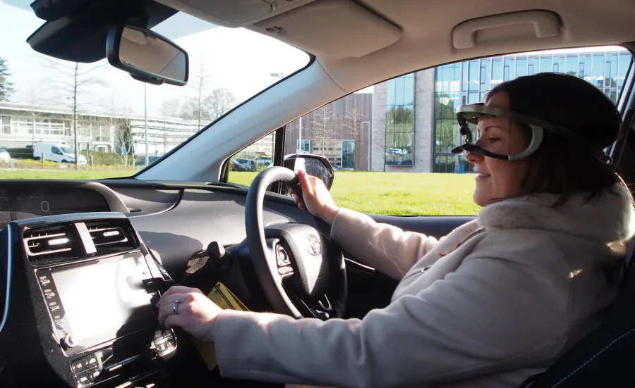 Student Katie Plant using the controls of an instrumented vehicle