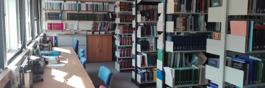 Library work desk and book shelves 