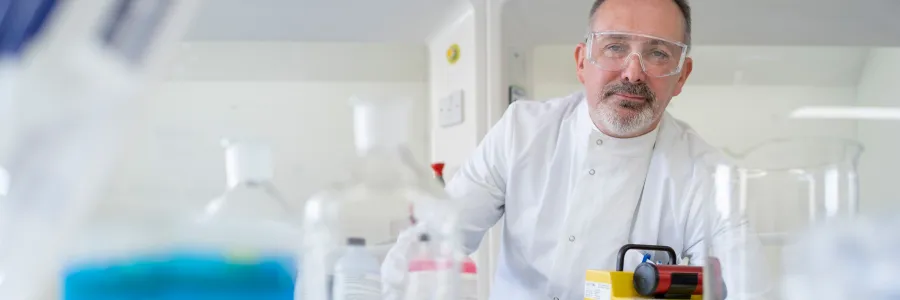 Scientist working with lab equipment