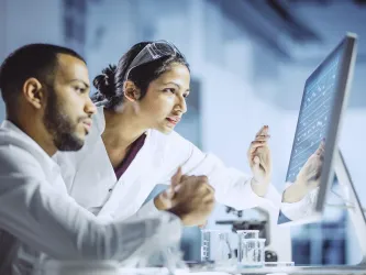 Image showing two doctors looking at a computer screen.