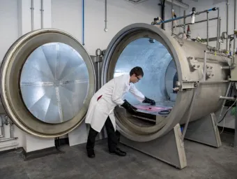 A student at work in the testing and structures research lab