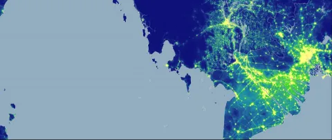 An aerial map coloured to show population distribution over a geographical area.