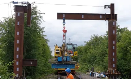 Crane working on train tracks