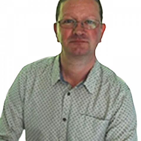 A head and shoulders image of Craig Webber, who wears a shirt and has glasses