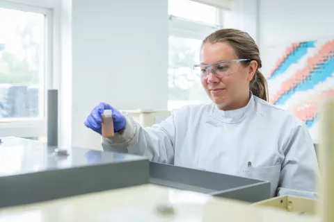 Scientist working with lab equipment