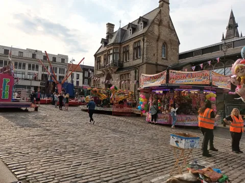 Wide shot of a market in a town centre