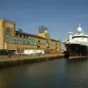 Waterfront Campus and the surrounding docks and boats on a sunny day.