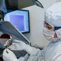 nanotechnology degree student in lab using scientific machinery