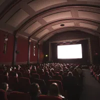 An audience watching a film