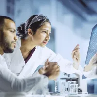 Image showing two doctors looking at a computer screen.