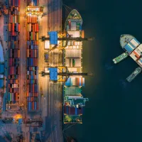 iStock aerial view of a commercial container ship in a dockyard