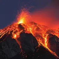 lava flowing down an erupting volcano